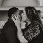 black and white image of brides to be kissing.