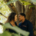 photo of brides to be by a tree.