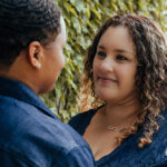 close up of brides lovingly gazing at each other.