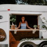 image of the owner of the tavern standing at the window. New Wave of Mobile Wedding Services