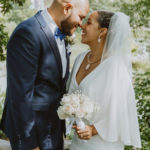 a closeup of the bride and groom smiling together. Intimate Central Park Wedding.