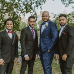 a photo of the groom standing with his groomsmen. Small central park wedding.