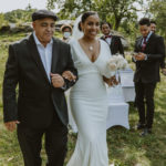 a photo of the father of the bride walking the bride down the aisle. Small Wedding in NYC