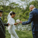 a photo of the father of the bride giving the bride away. Small Wedding in NYC