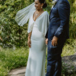 the bride and groom about to take their first walk as husband and wife. Small central park wedding.