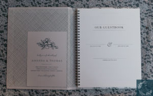 a close up photo of the inside cover of a wedding guestbook from the company Basic Invite.