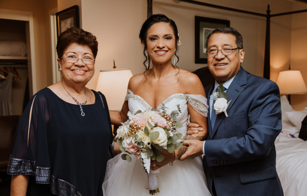 wedding at the thayer hotel bride with parents in hotel room