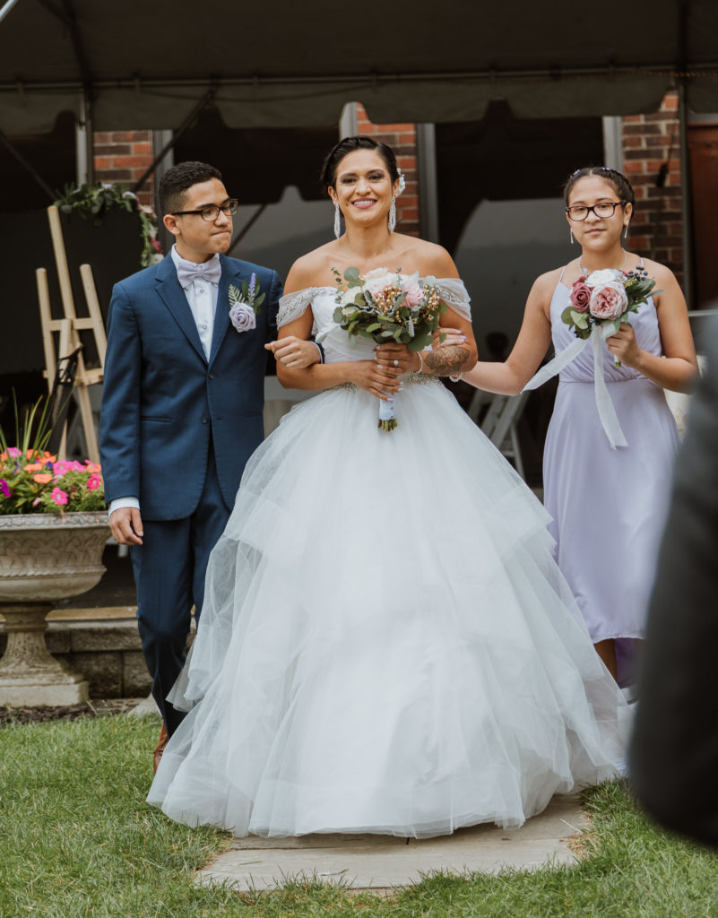 children walk their mother down the aisle on wedding day thatyer hotel west point new york