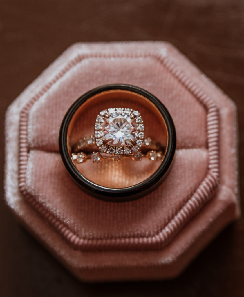 close up shot of wedding ring and band