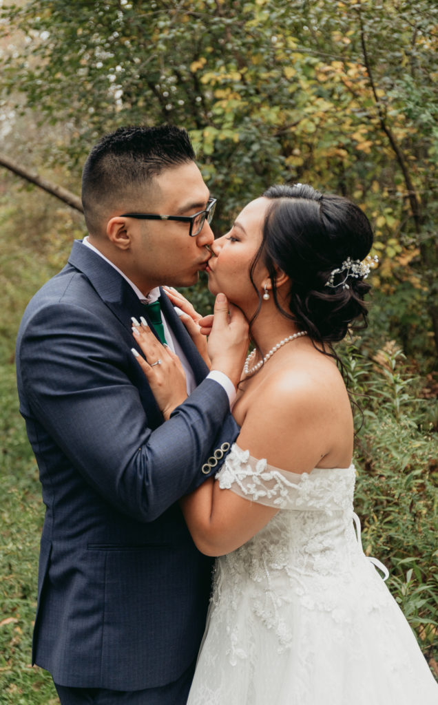 bride and groom kiss the appel inn