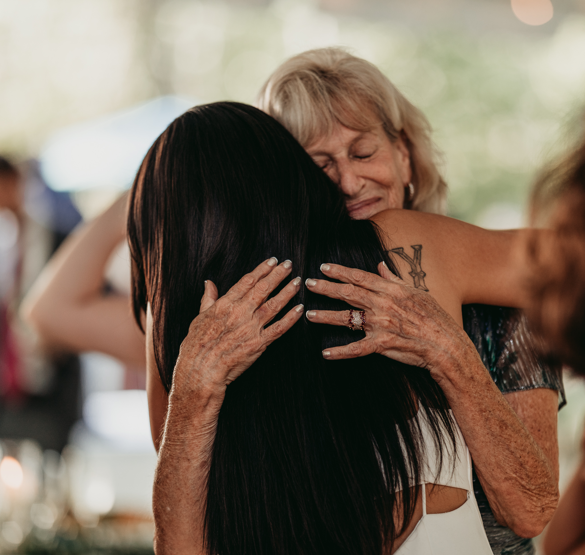 mom hugs bride back yard wedding new paltz new york crys torres photography