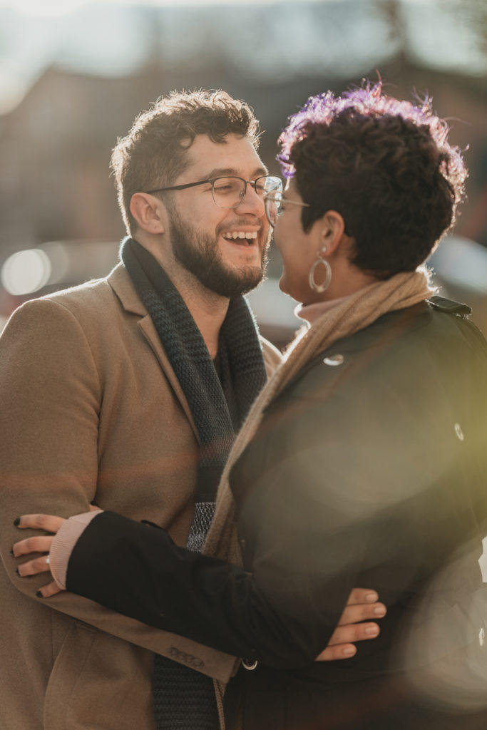 couple laughing just engaged new york winter photos